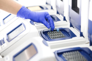 rt pcr 300x200 - Scientist with DNA copying, Real-time cycler, wide